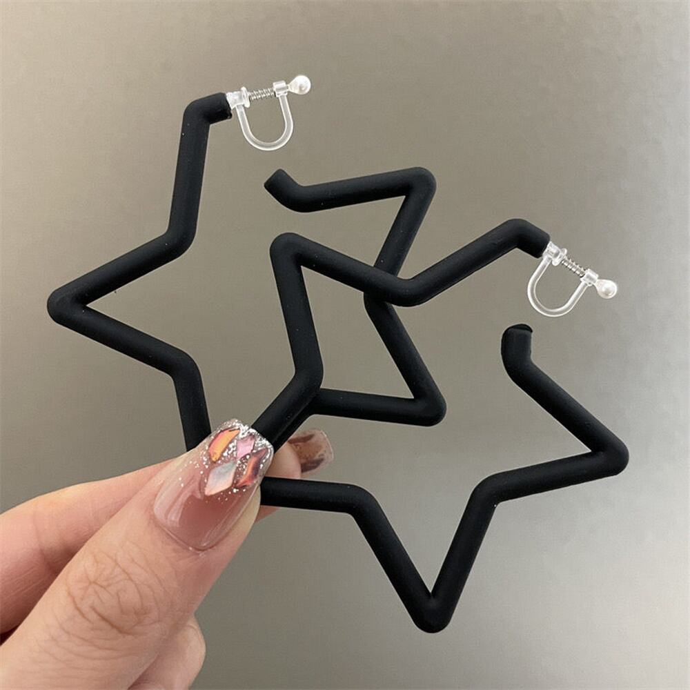 Clip on 2 3/4" large plastic clasp black star earrings